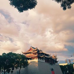 Low angle view of traditional building against sky