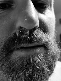Close-up of man looking away outdoors