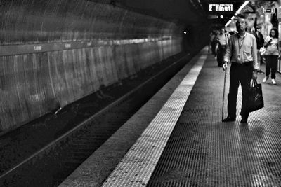 People waiting at subway station