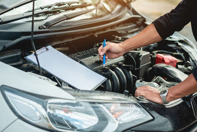 Man working in car