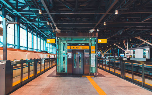 Interior of illuminated railroad station