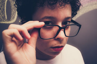 Close-up portrait of woman wearing eyeglasses