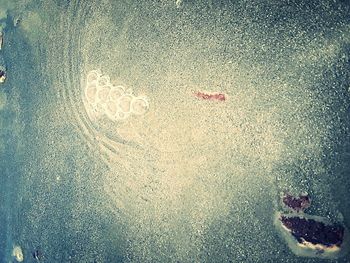 High angle view of sand on beach