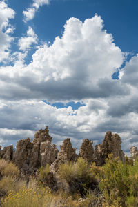 View of rock formations on landscape against sky