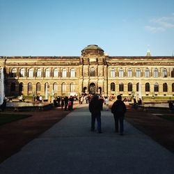 Tourists in front of historical building