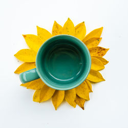 High angle view of tea cup against white background