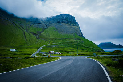 Scenic view of mountain road against sky