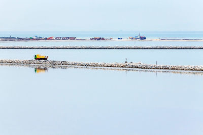 Scenic view of sea against clear sky