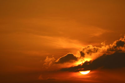 Low angle view of dramatic sky during sunset