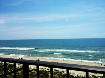 Scenic view of sea against blue sky