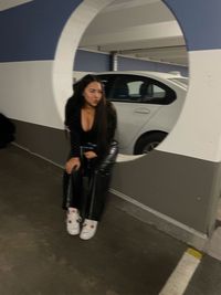 Young woman looking out of car