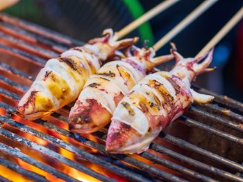 Close-up of meat on barbecue grill