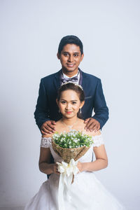 Portrait of a smiling young couple