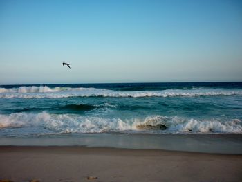 Scenic view of sea against clear sky