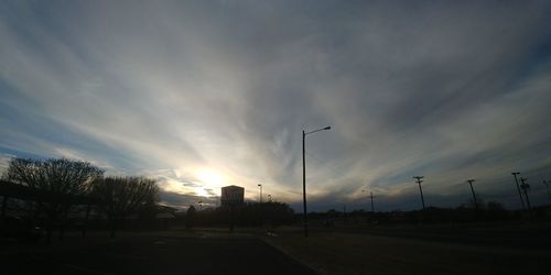 Silhouette of road at sunset