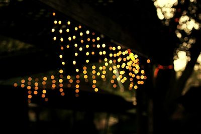 Close-up of illuminated lights at night