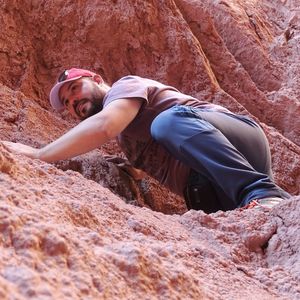 Young man standing on rock