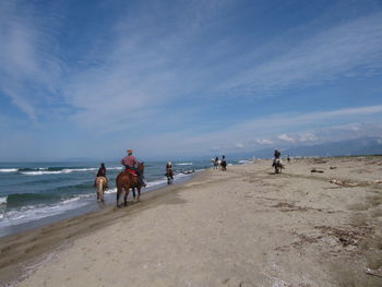 Scenic view of sea against cloudy sky