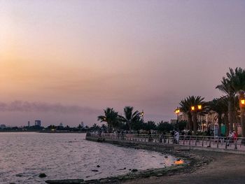 Scenic view of beach against sky during sunset