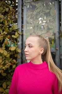 Portrait of a beautiful young woman looking away