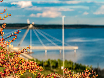 Scenic view of sea against cloudy sky