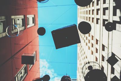 Low angle view of road signal against sky