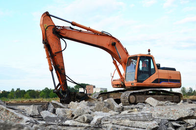 Construction site on field against sky