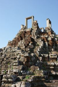 Low angle view of old ruins against sky