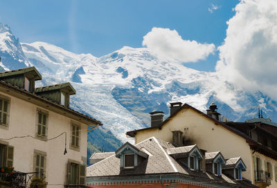 Panoramic view of snowcapped mountains against sky