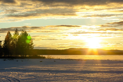 Scenic view of sunset over river