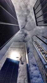 Low angle view of modern buildings against sky