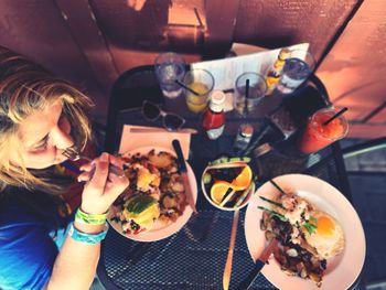 High angle view of woman having breakfast