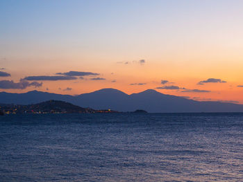 Scenic view of mountains against sky during sunset