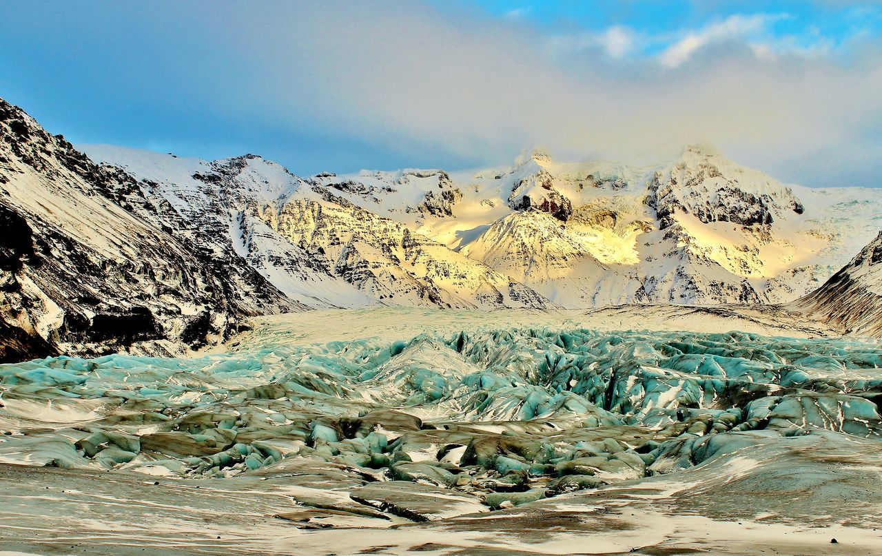 SCENIC VIEW OF SNOW COVERED MOUNTAINS