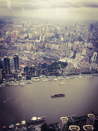 High angle view of buildings against sky in city