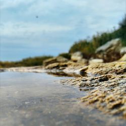 Surface level of sea against sky