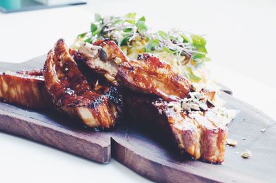 Close-up of meat on cutting board