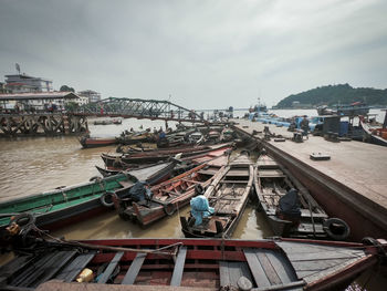 Panoramic view of boats moored at harbor