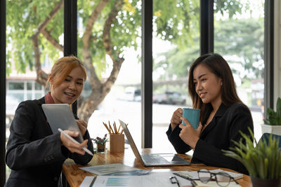 Business colleagues working at office