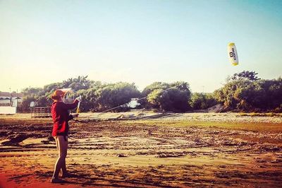 Woman standing on field