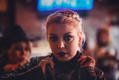 Portrait of young woman looking away