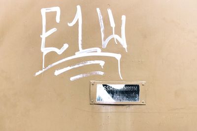 Close-up of text on the wall