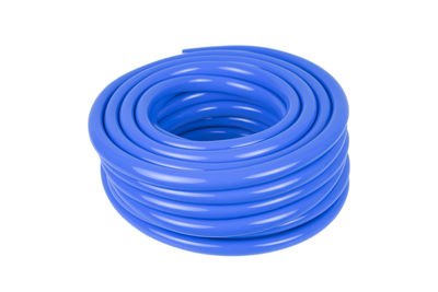 High angle view of blue smoke against white background