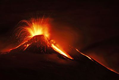 Volcanic eruption against sky