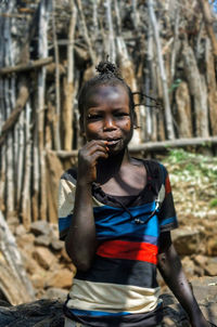 Portrait of a smiling young man in forest