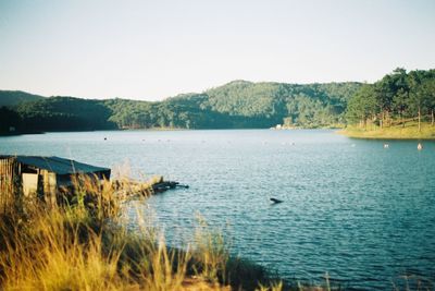 Scenic view of lake with mountains in background