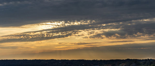 Scenic view of silhouette landscape against sky during sunset