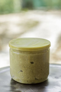 Close-up of peanut butter in jar