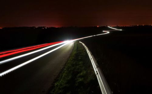 Light trails on road at night