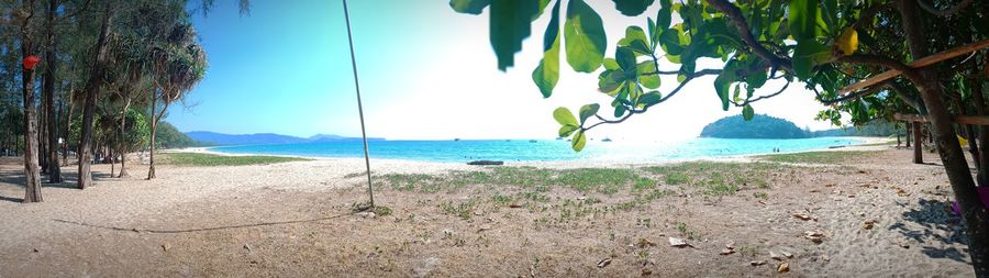 Scenic view of beach against sky